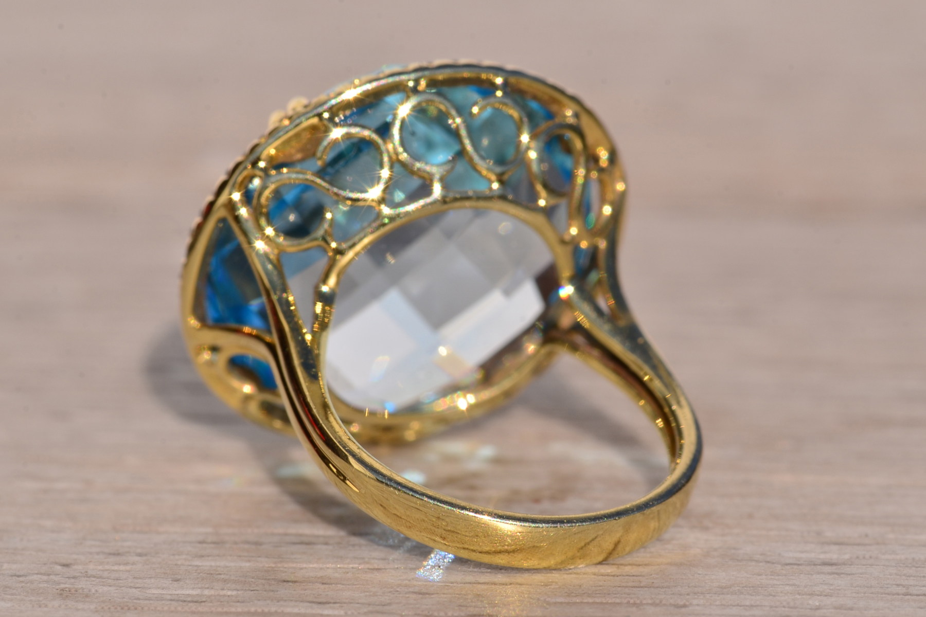 The 11th Avenue: Checkerboard Cut Blue Topaz and Diamond Halo Cocktail Ring - Image 4