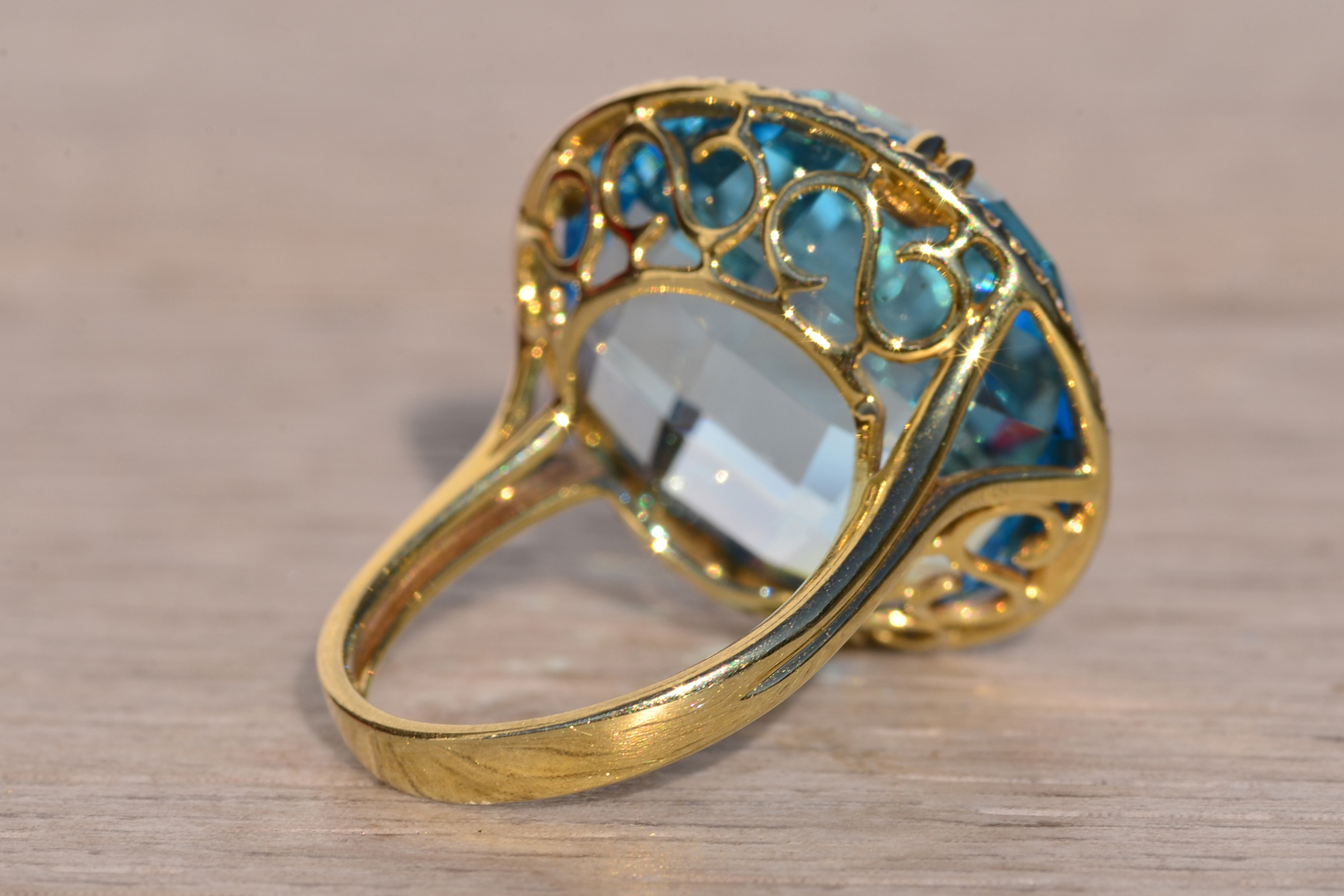 The 11th Avenue: Checkerboard Cut Blue Topaz and Diamond Halo Cocktail Ring - Image 5