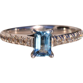 The 10th Avenue: Emerald Cut Blue Topaz and Diamond Ring in White Gold