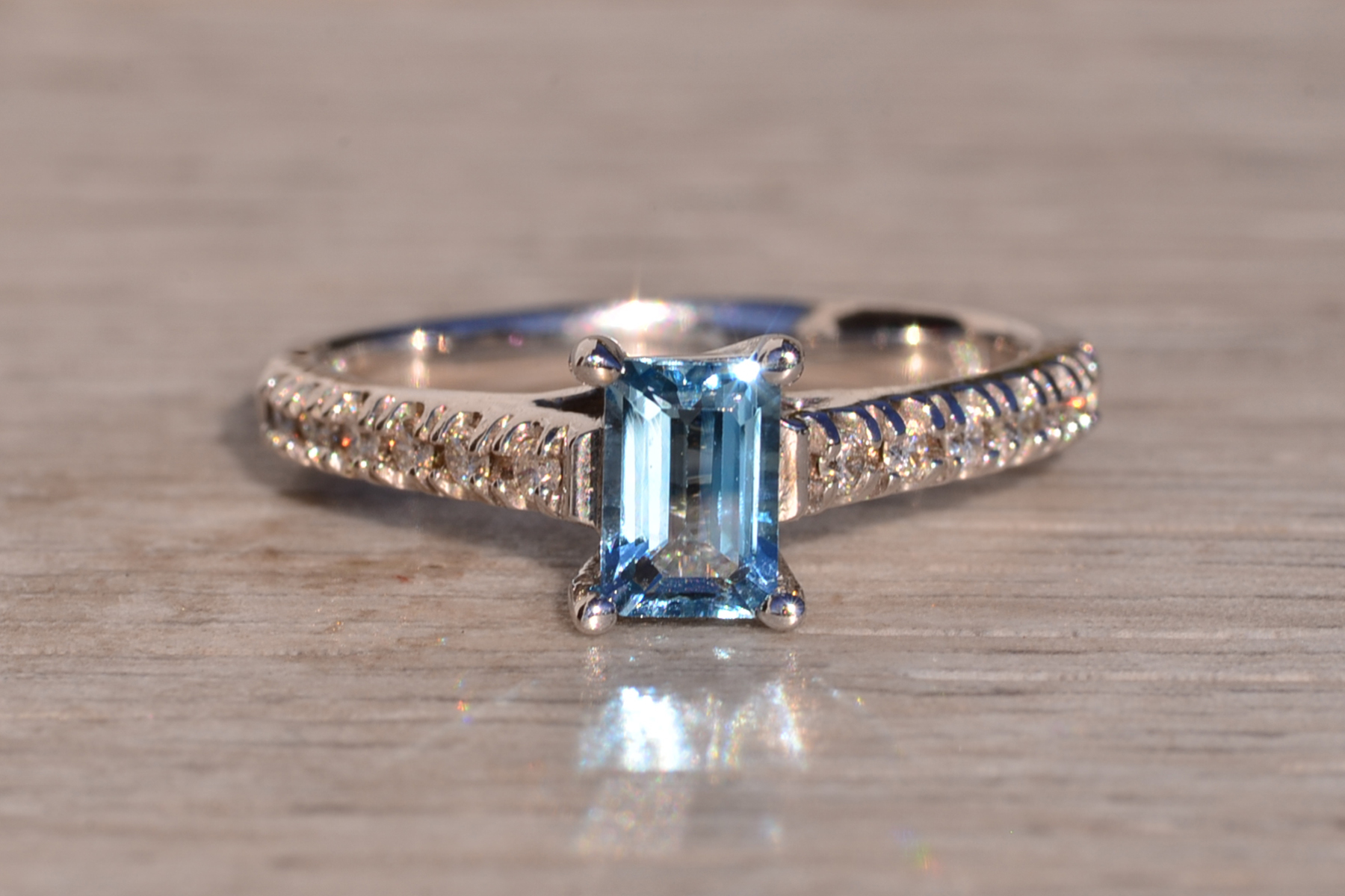 The 10th Avenue: Emerald Cut Blue Topaz and Diamond Ring in White Gold - Image 2