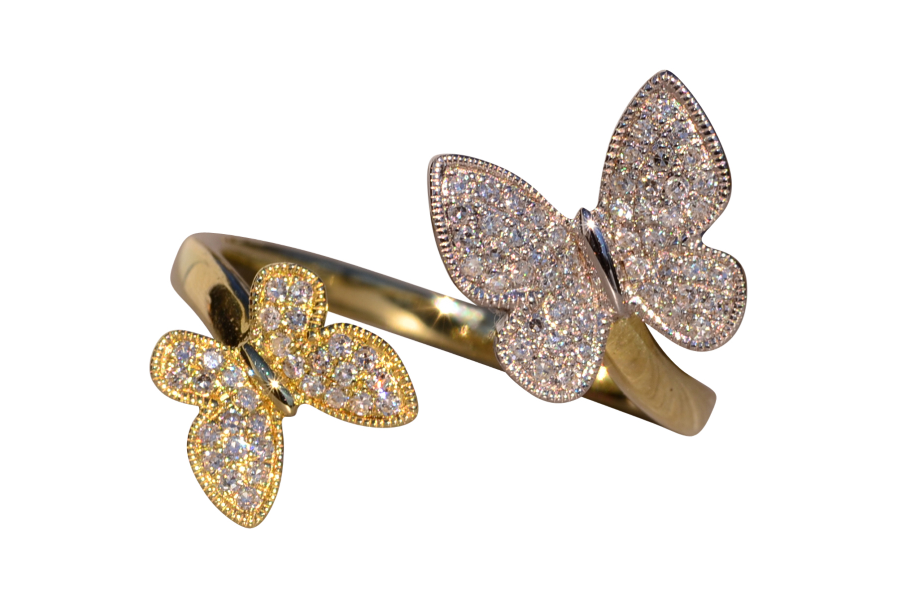 The 5th Avenue: Butterfly Bypass Ring in White and Yellow Gold