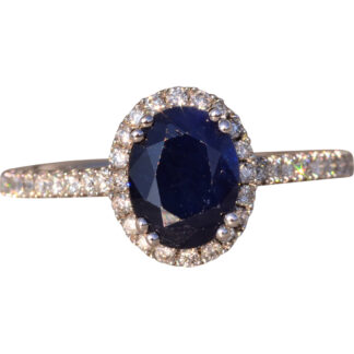 The 77th Avenue: Oval Sapphire and Diamond Halo Ring in White Gold