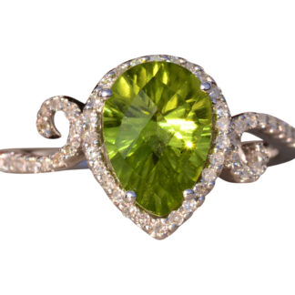 The 92nd Avenue: Peridot and Natural Diamond Ring in White Gold