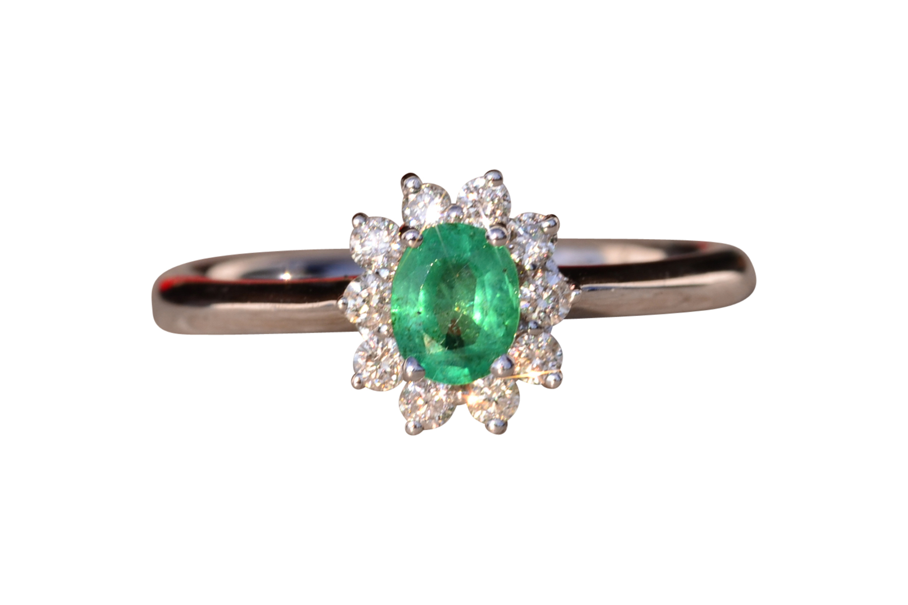 The 89th Avenue: Natural Emerald and Diamond Halo Ring in White Gold
