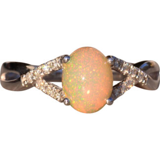 The 107th Street: Opal and Diamond Ring in White Gold