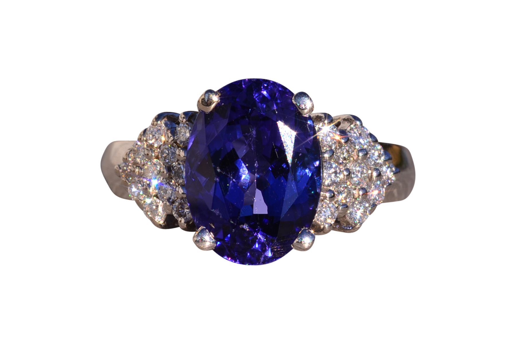The 153rd Avenue: Oval Brilliant Cut Tanzanite and Natural Diamond Ring in White Gold