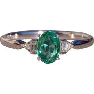 The 163rd Avenue: Vivid Natural Oval Emerald and Natural Diamond Ring