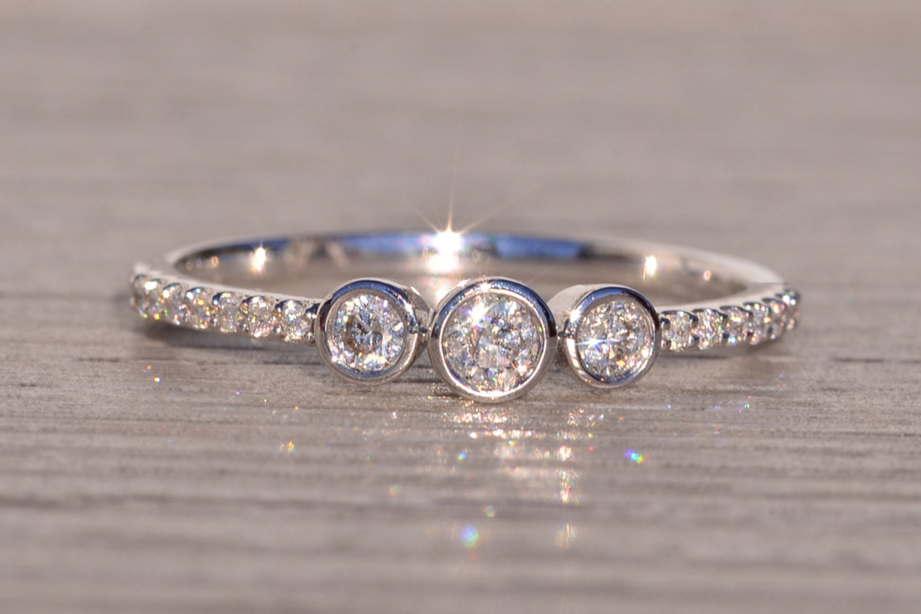 The 168th Avenue: Bezel Set Natural Diamond Three Stone Ring - Image 2
