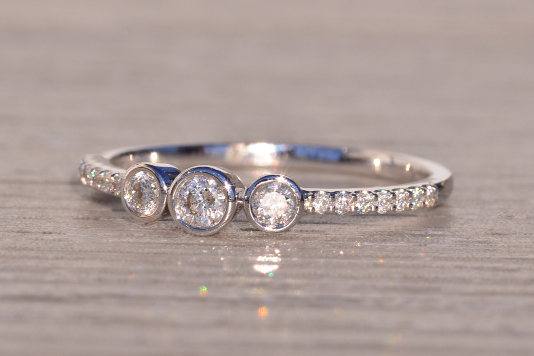 The 168th Avenue: Bezel Set Natural Diamond Three Stone Ring - Image 3