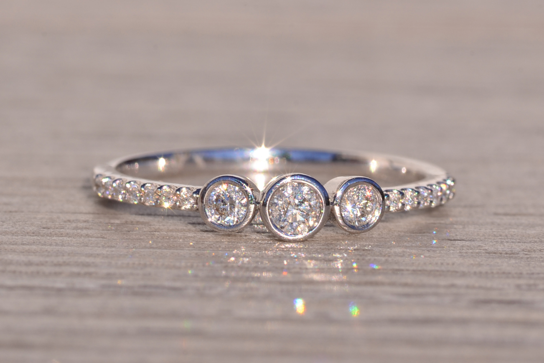 The 168th Avenue: Bezel Set Natural Diamond Three Stone Ring - Image 7