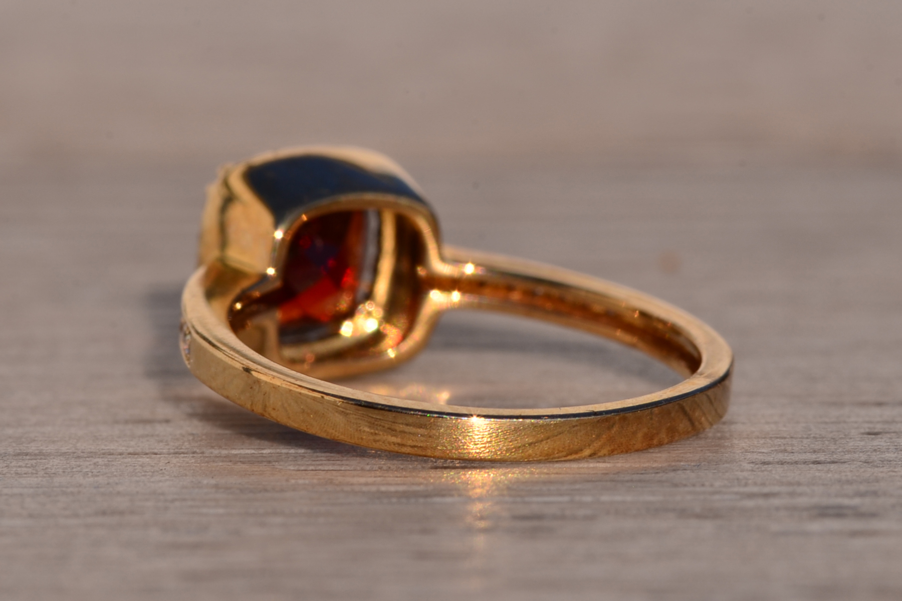 The 119th Avenue: Cushion Shaped Garnet and Natural Diamond Halo Ring in Yellow Gold - Image 4