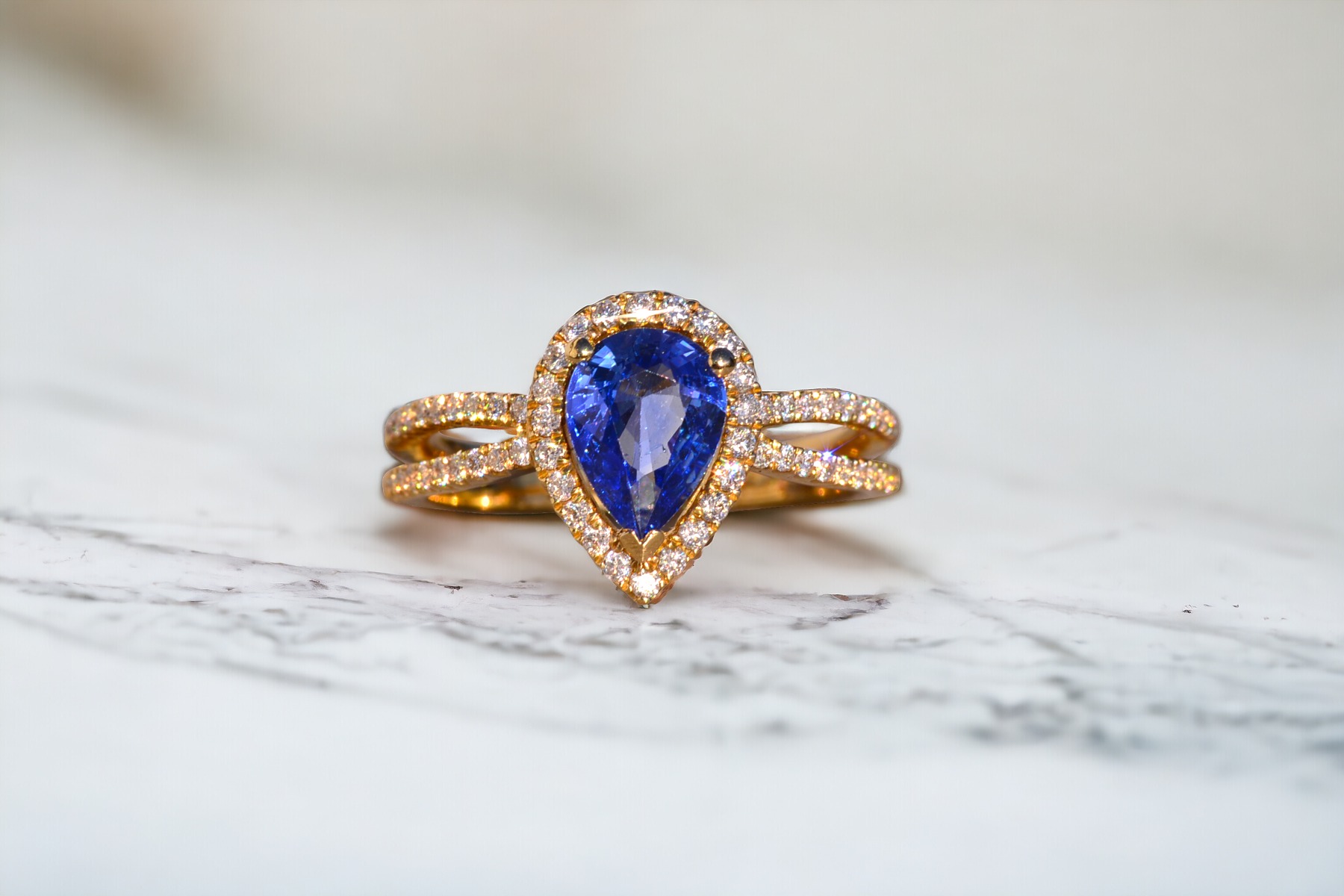 The 126th Avenue: Pear Shaped Tanzanite and Natural Diamond Ring in Yellow Gold - Image 11