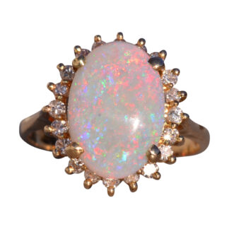 SOLD - The 181st Avenue: Vintage Australian Opal and Natural Diamond Halo Ring in Yellow Gold