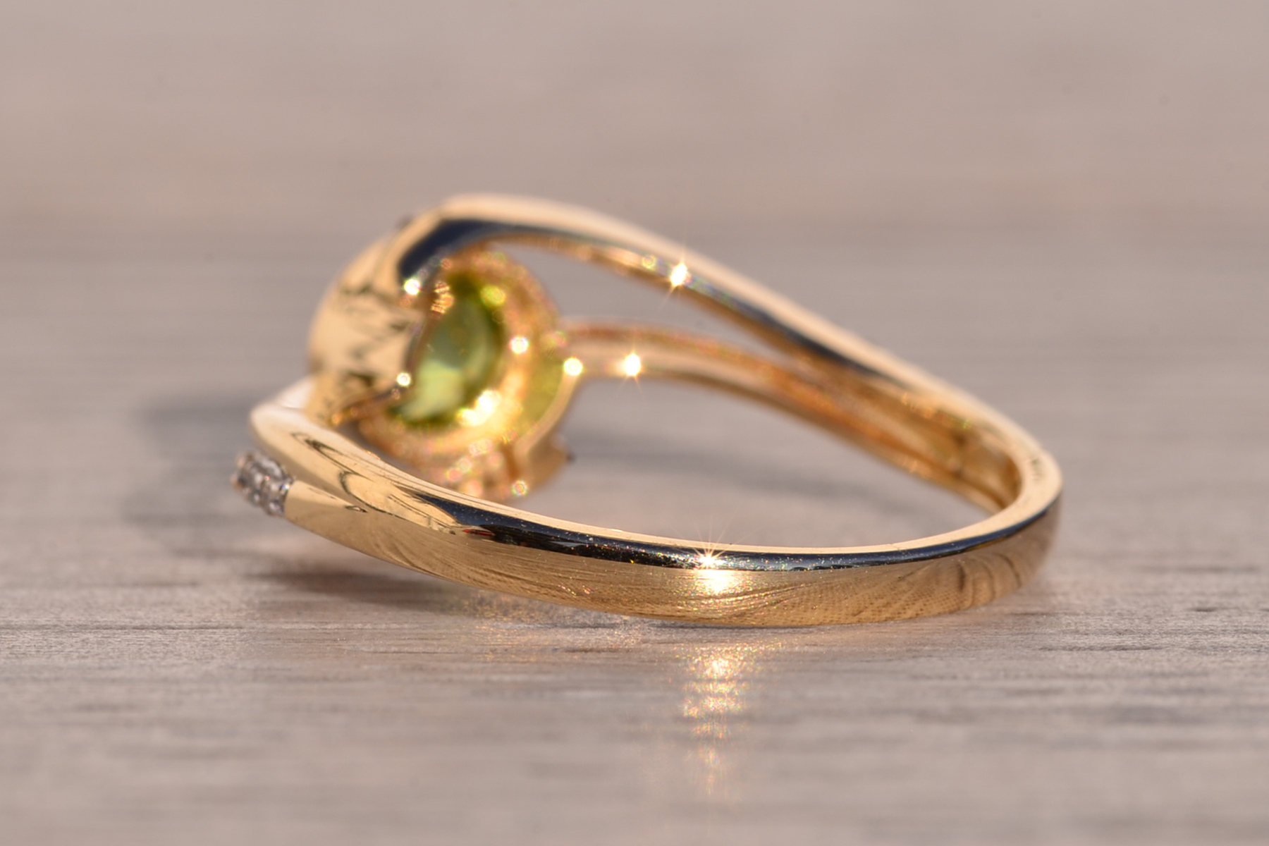 SOLD - The 195th Avenue: Modern Peridot and Diamond Bypass Ring in Yellow Gold - Image 4