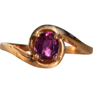 Ocho Calle: Reddish-Purple Natural Sapphire in Yellow Gold Bypass Ring