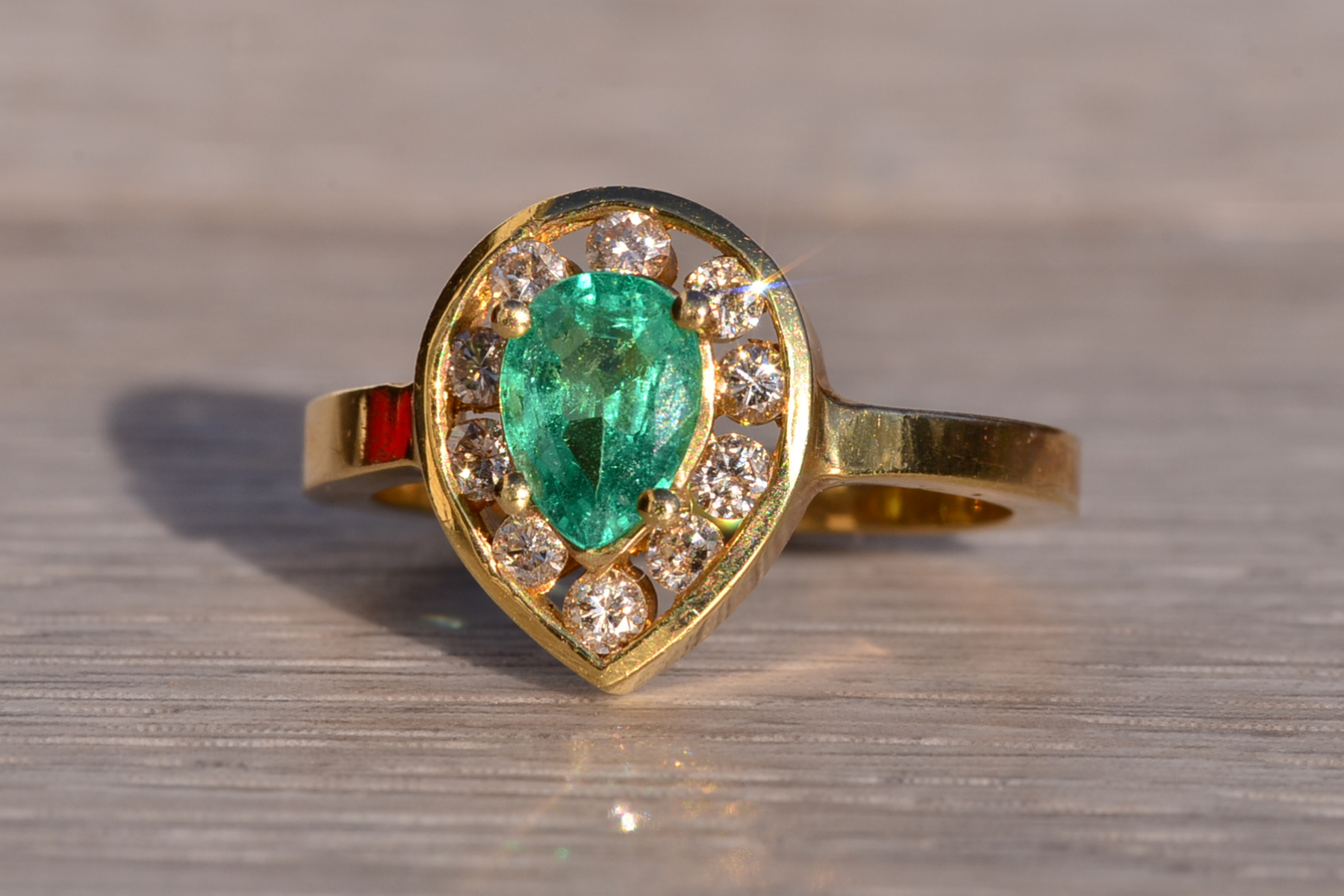 The Mount Foraker: Modern Pear Shaped Natural Emerald and Diamond Ring in Yellow Gold - Image 3