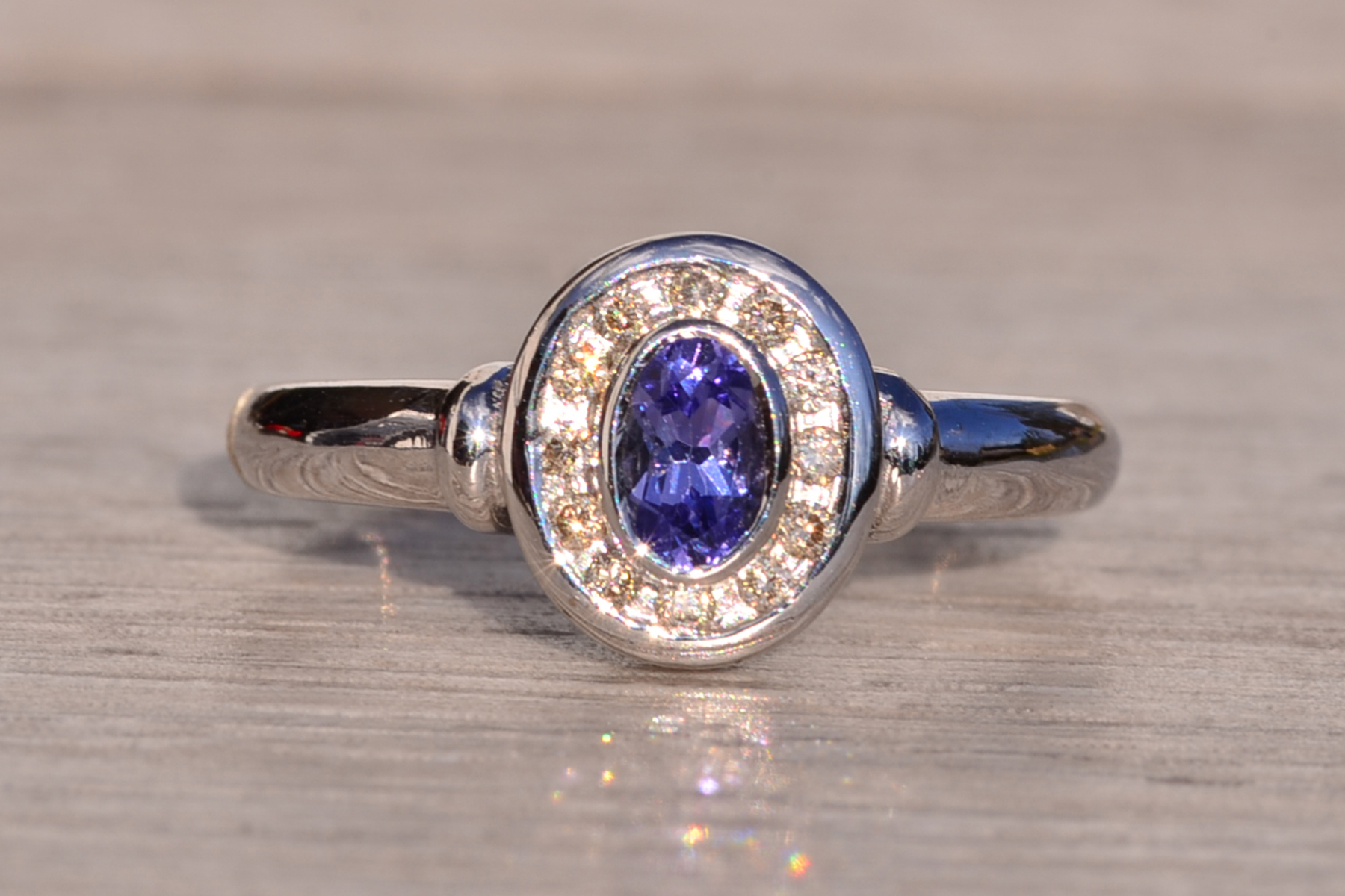 SOLD - The Mount Hayes: Oval Tanzanite and Diamond Halo Ring in White Gold - Image 2