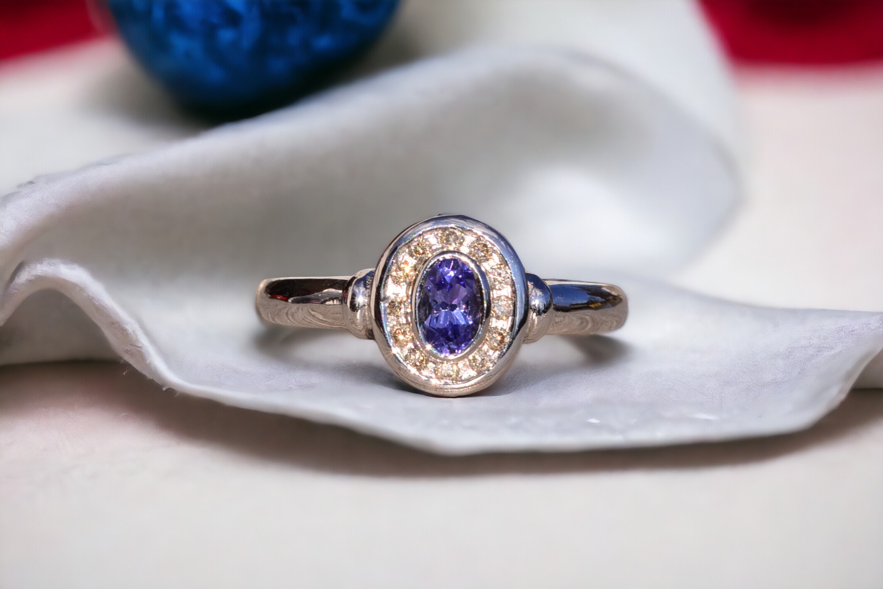 SOLD - The Mount Hayes: Oval Tanzanite and Diamond Halo Ring in White Gold - Image 11