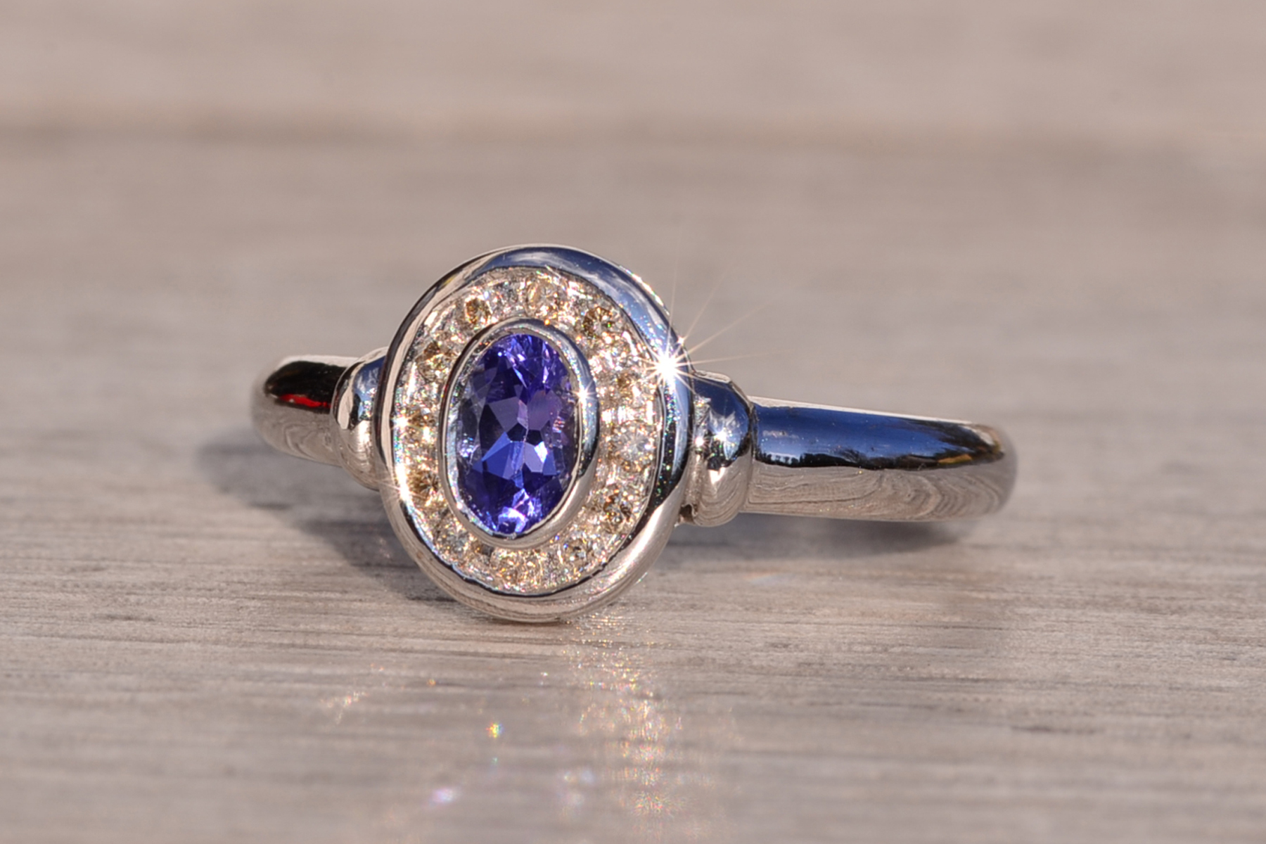 SOLD - The Mount Hayes: Oval Tanzanite and Diamond Halo Ring in White Gold - Image 3