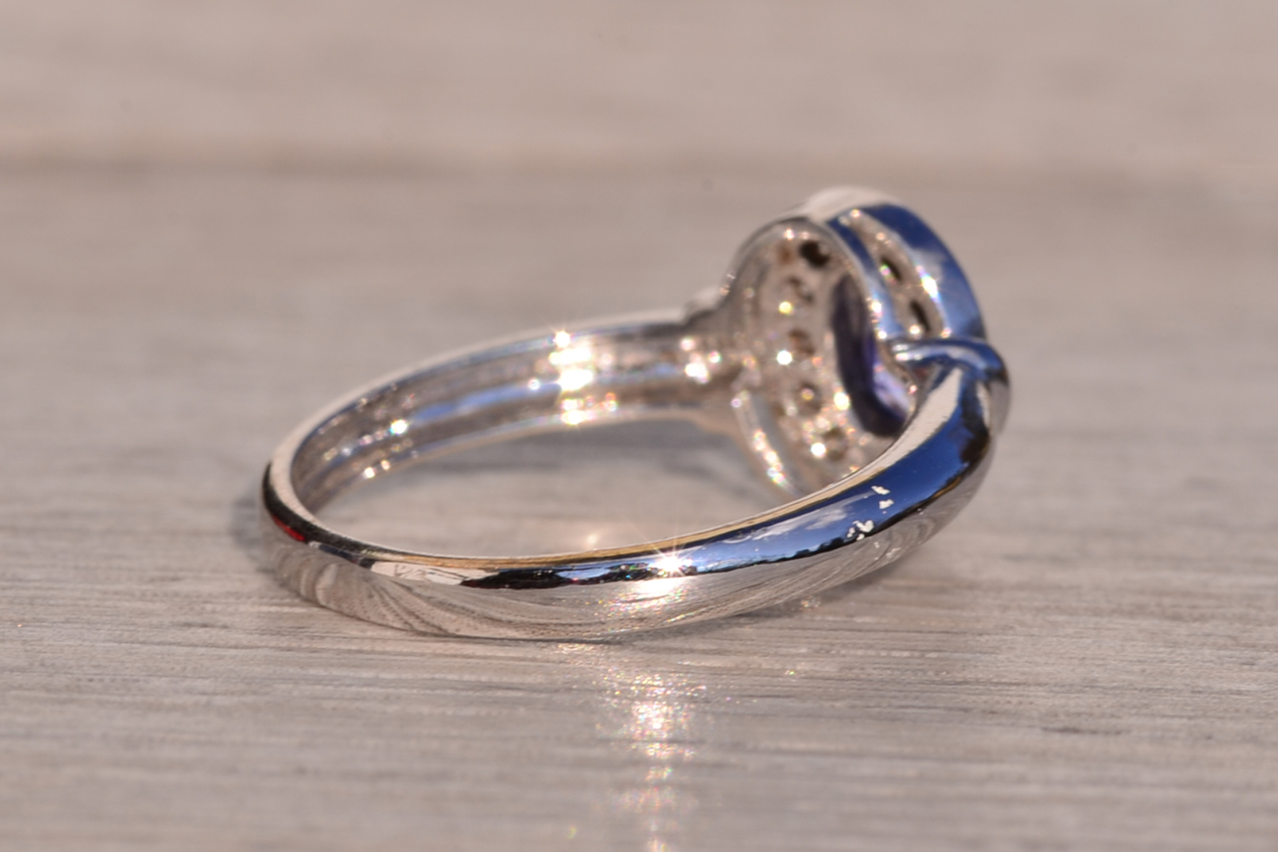 SOLD - The Mount Hayes: Oval Tanzanite and Diamond Halo Ring in White Gold - Image 5
