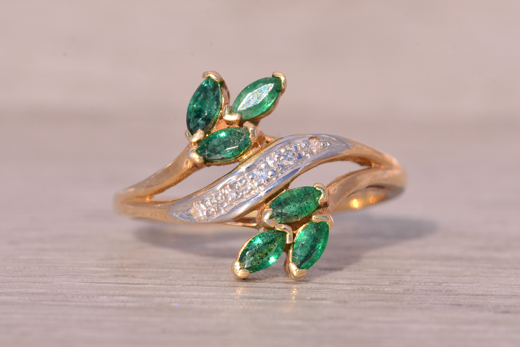 The Bifan: Emerald and Natural Diamond Bypass Ring in Yellow Gold - Image 2