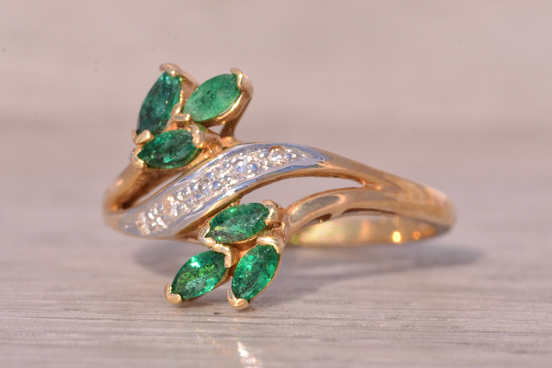 The Bifan: Emerald and Natural Diamond Bypass Ring in Yellow Gold - Image 3