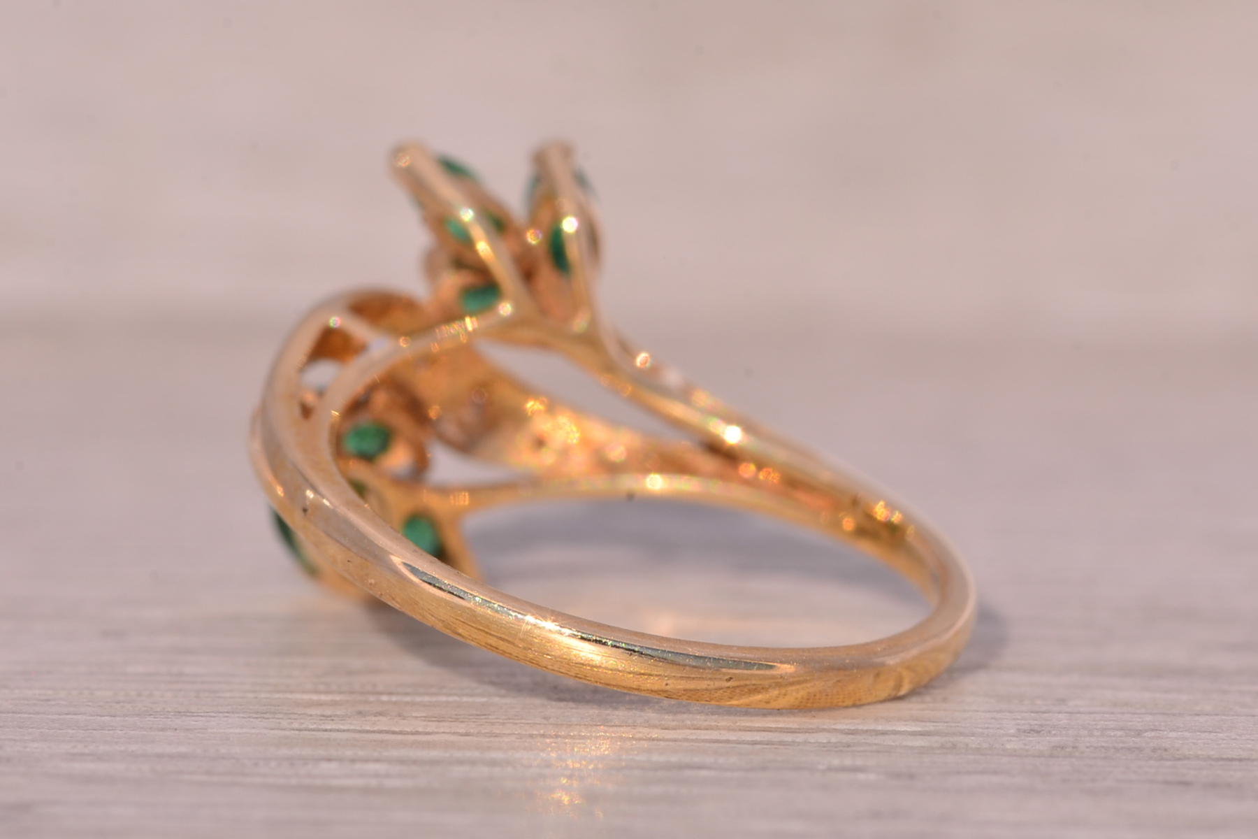The Bifan: Emerald and Natural Diamond Bypass Ring in Yellow Gold - Image 4