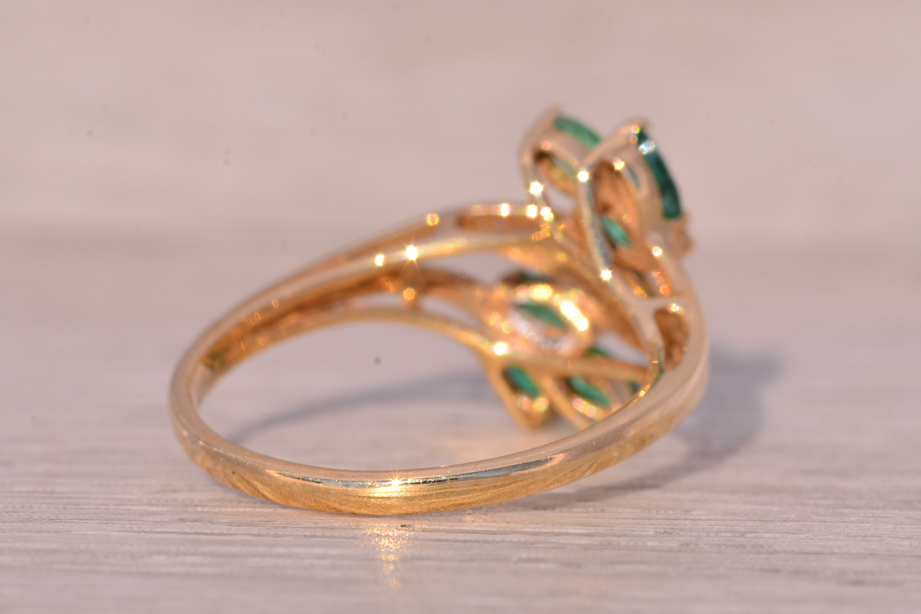 The Bifan: Emerald and Natural Diamond Bypass Ring in Yellow Gold - Image 5