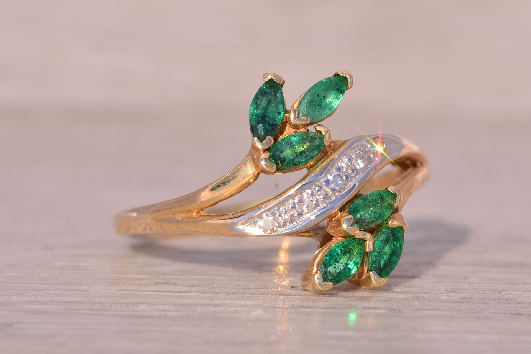 The Bifan: Emerald and Natural Diamond Bypass Ring in Yellow Gold - Image 6