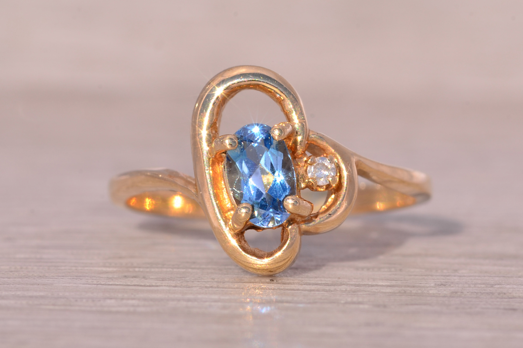 The Saskatoon: Blue Topaz and Natural Diamond Cocktail Ring in Yellow Gold - Image 2