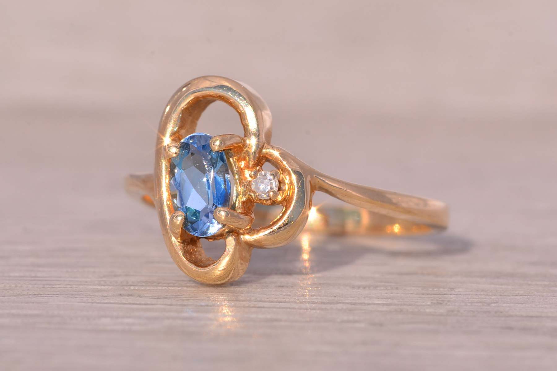 The Saskatoon: Blue Topaz and Natural Diamond Cocktail Ring in Yellow Gold - Image 3