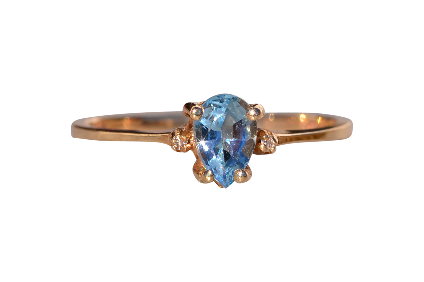 The Tint: Pear Shaped Swiss Blue Topaz and Natural Diamond Ring in Yellow Gold
