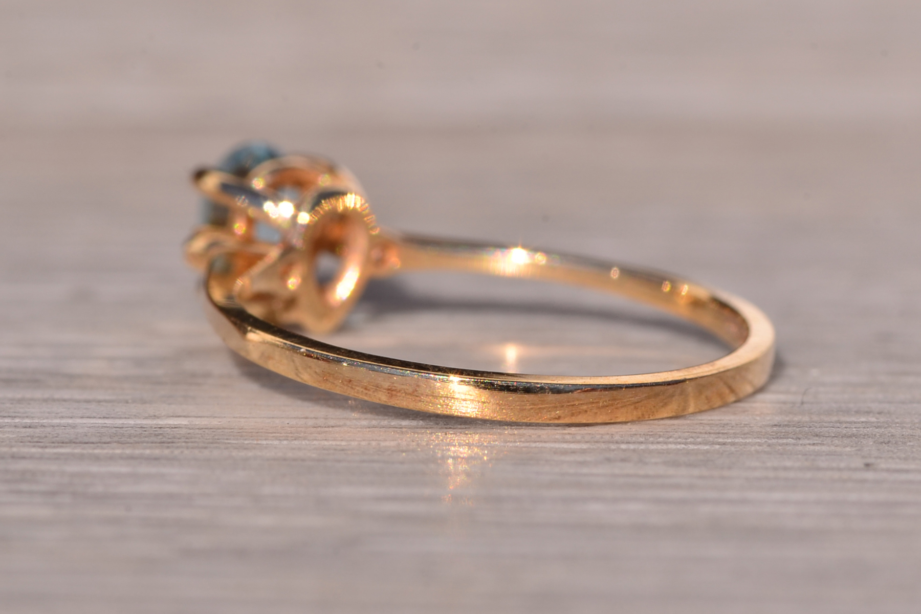 The Tint: Pear Shaped Swiss Blue Topaz and Natural Diamond Ring in Yellow Gold - Image 5