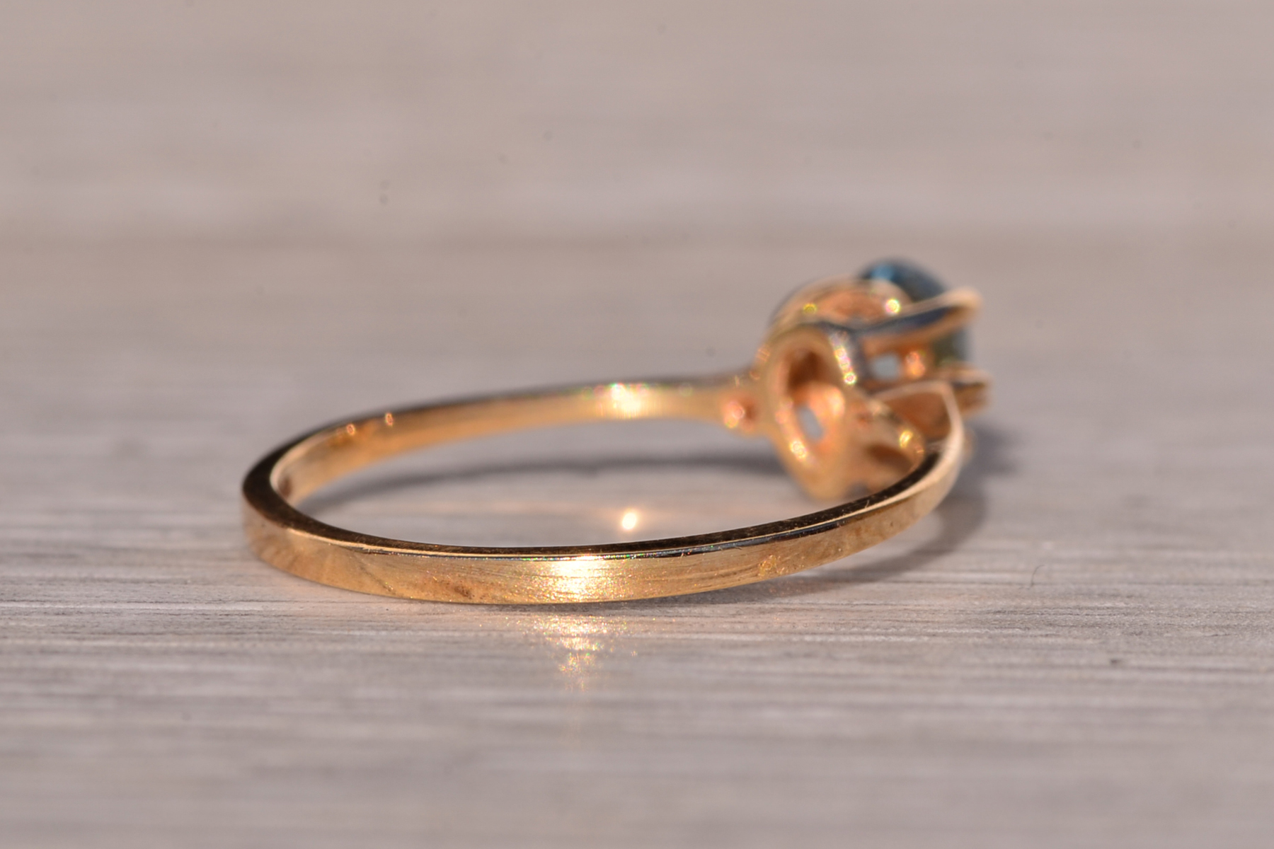 The Tint: Pear Shaped Swiss Blue Topaz and Natural Diamond Ring in Yellow Gold - Image 6