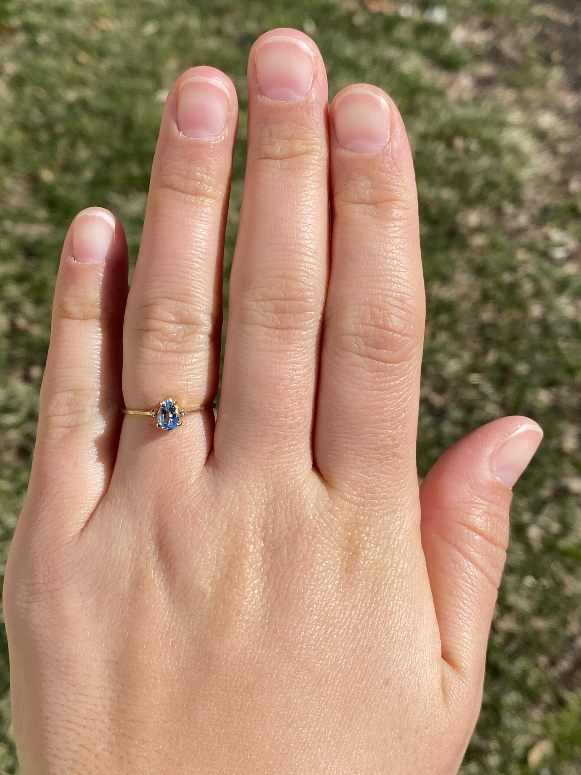 The Tint: Pear Shaped Swiss Blue Topaz and Natural Diamond Ring in Yellow Gold - Image 9