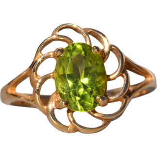 The Spiralizer: Spiralized Oval Peridot Ring in Yellow Gold