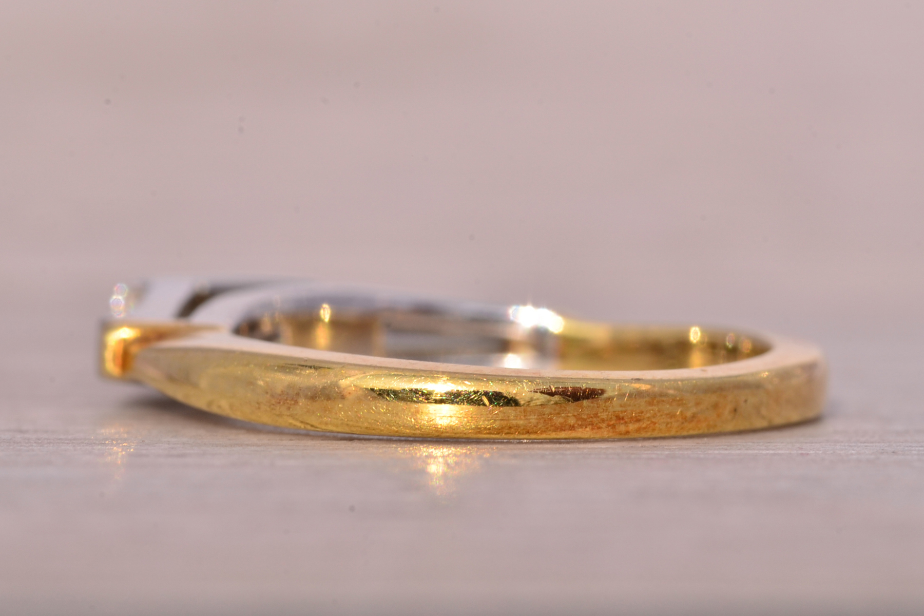 The Skib: Triple Baguette Band in Platinum and Yellow Gold - Image 4