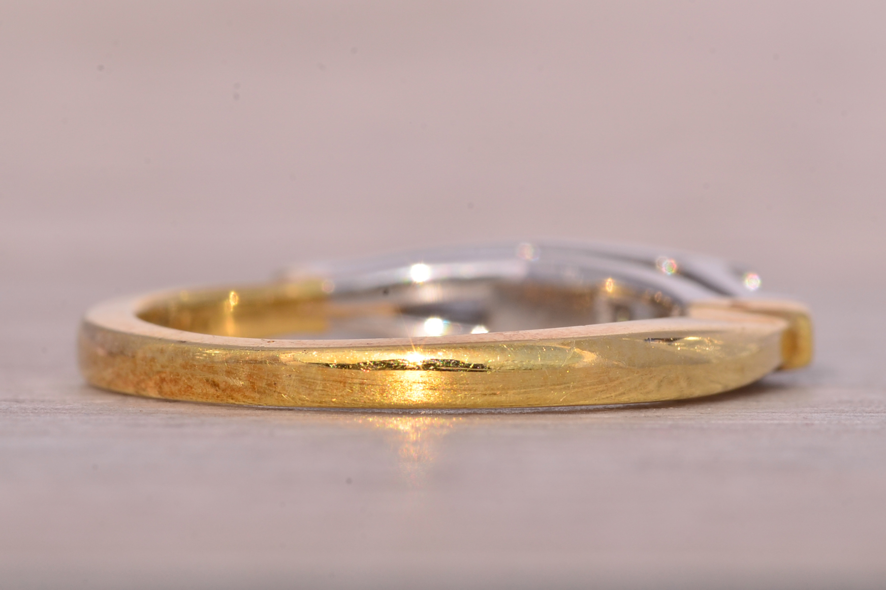 The Skib: Triple Baguette Band in Platinum and Yellow Gold - Image 5