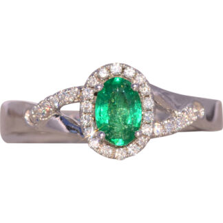 The Hands: Natural Emerald and Diamond Halo Ring in White Gold