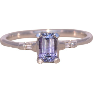 The Twilight Gleam: Tanzanite and Diamond Ring in White Gold