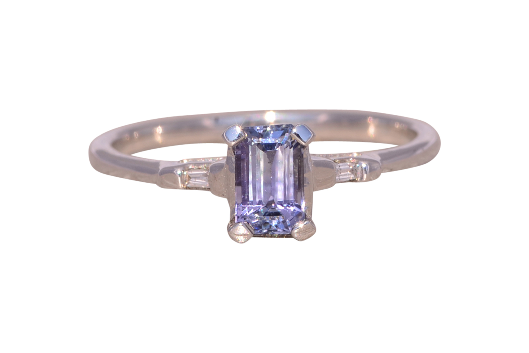 The Twilight Gleam: Tanzanite and Diamond Ring in White Gold