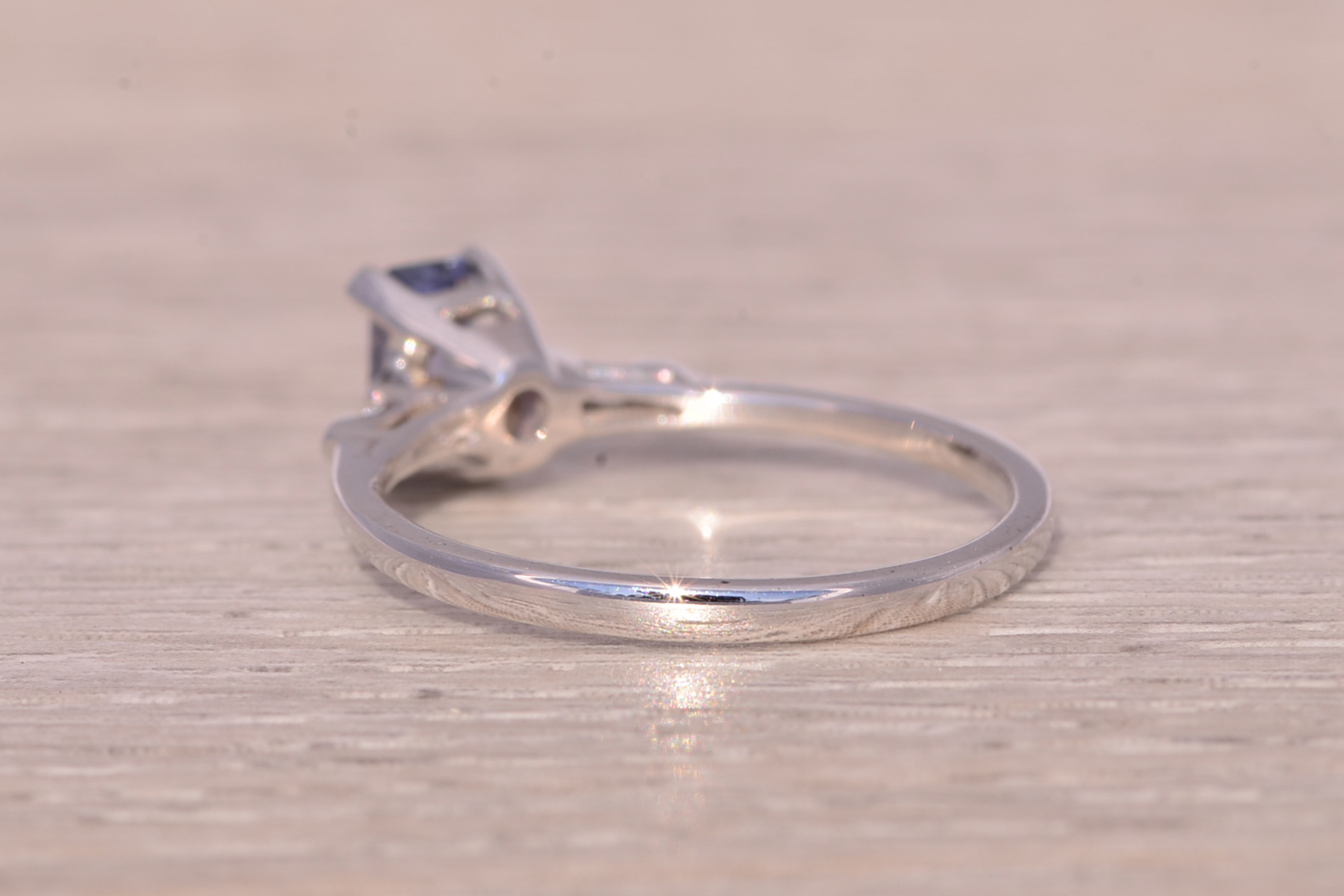 The Twilight Gleam: Tanzanite and Diamond Ring in White Gold - Image 4
