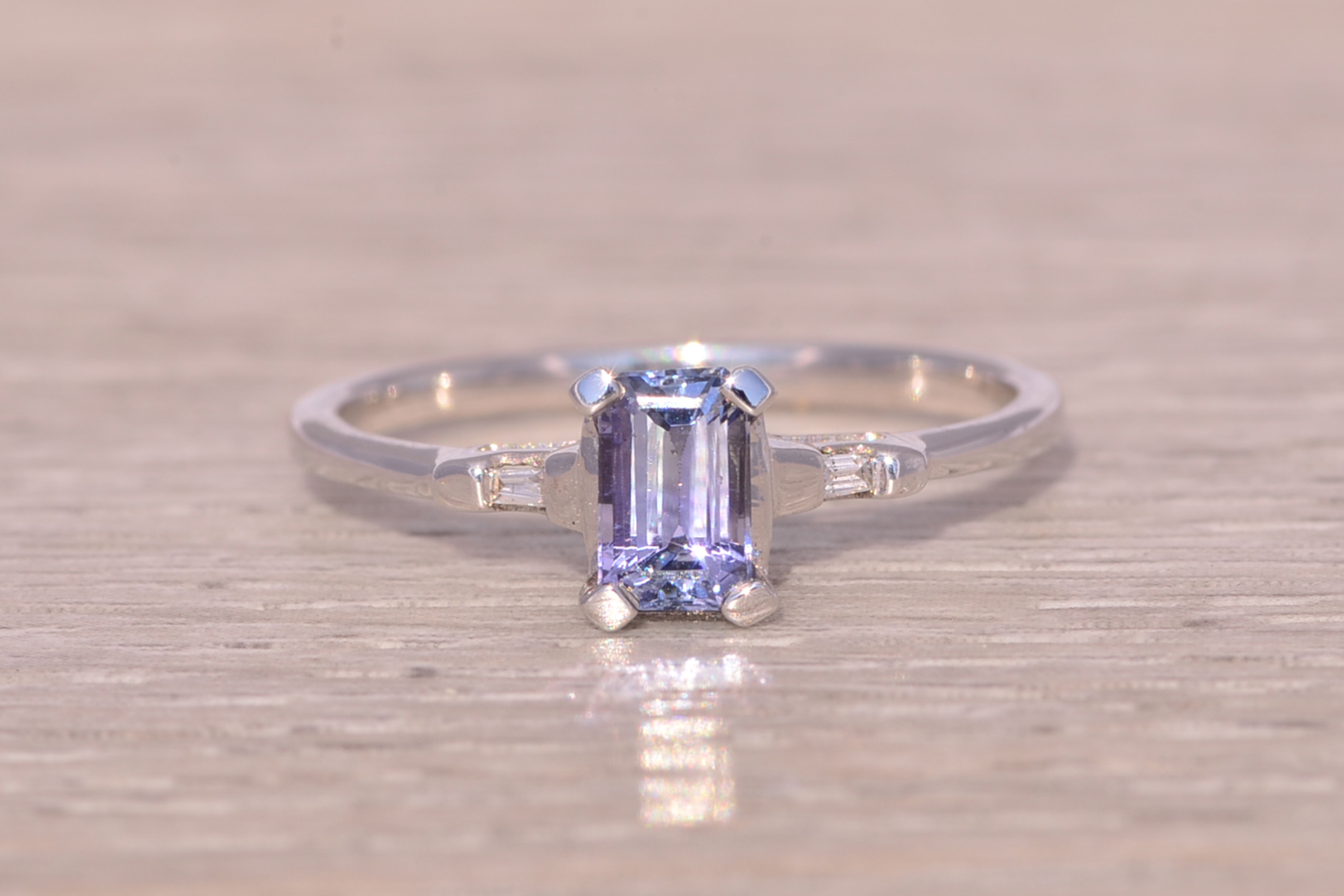 The Twilight Gleam: Tanzanite and Diamond Ring in White Gold - Image 7