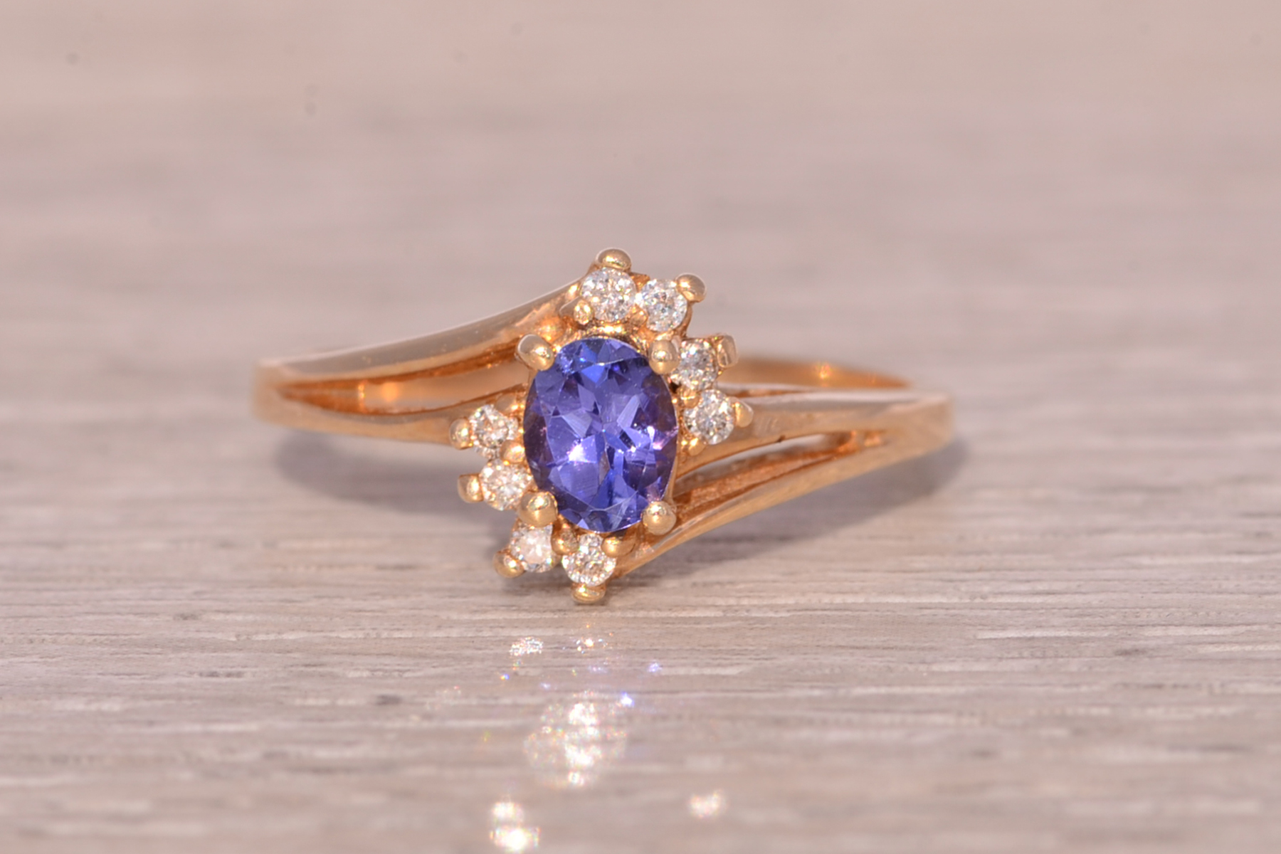 The Celestial Bloom: Tanzanite and Diamond Ring in Yellow Gold - Image 2