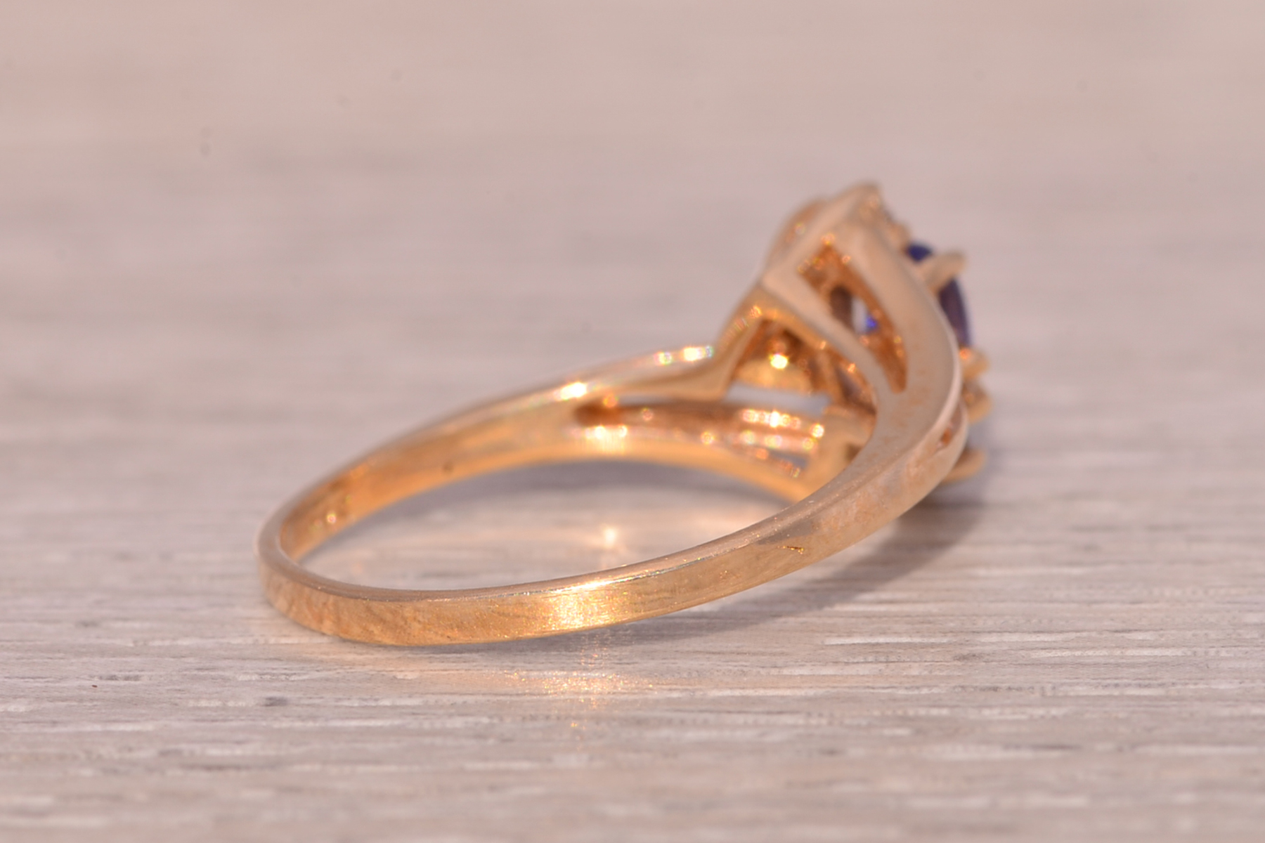 The Celestial Bloom: Tanzanite and Diamond Ring in Yellow Gold - Image 5