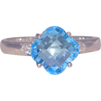 The Clover Cut Radiance: Blue Topaz and Diamond Ring in White Gold