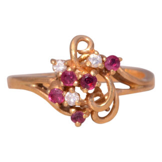 The Scarlet Swirl: Ruby and Diamond Ring in Yellow Gold