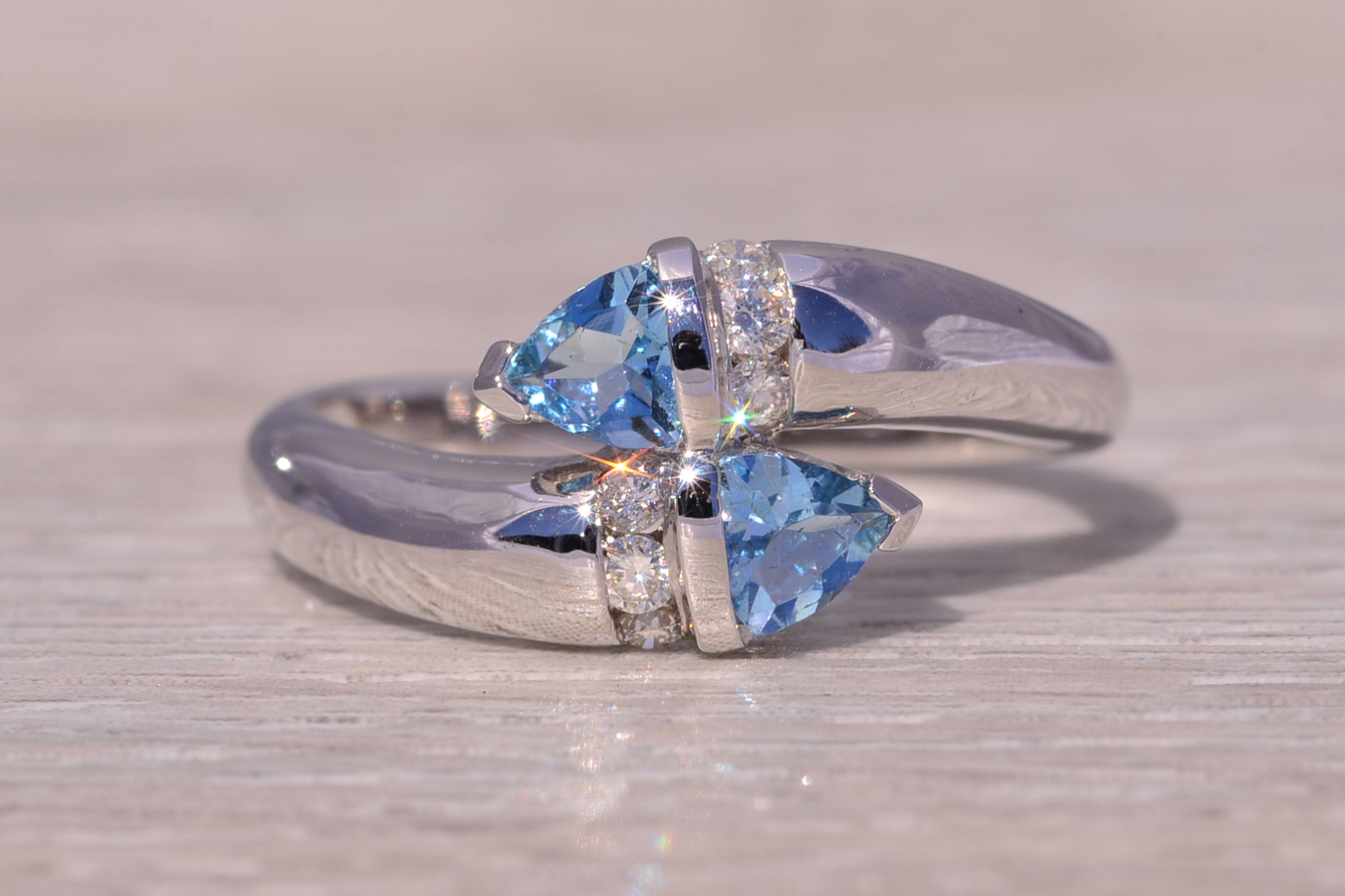 The Ocean's Embrace: Aquamarine and Diamond Bypass Ring in White Gold - Image 2