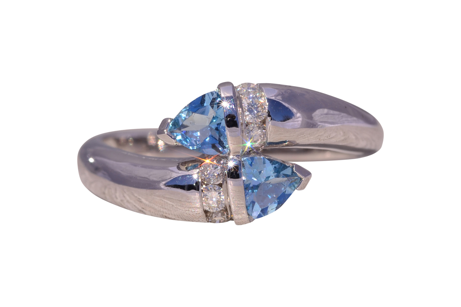 The Ocean's Embrace: Aquamarine and Diamond Bypass Ring in White Gold