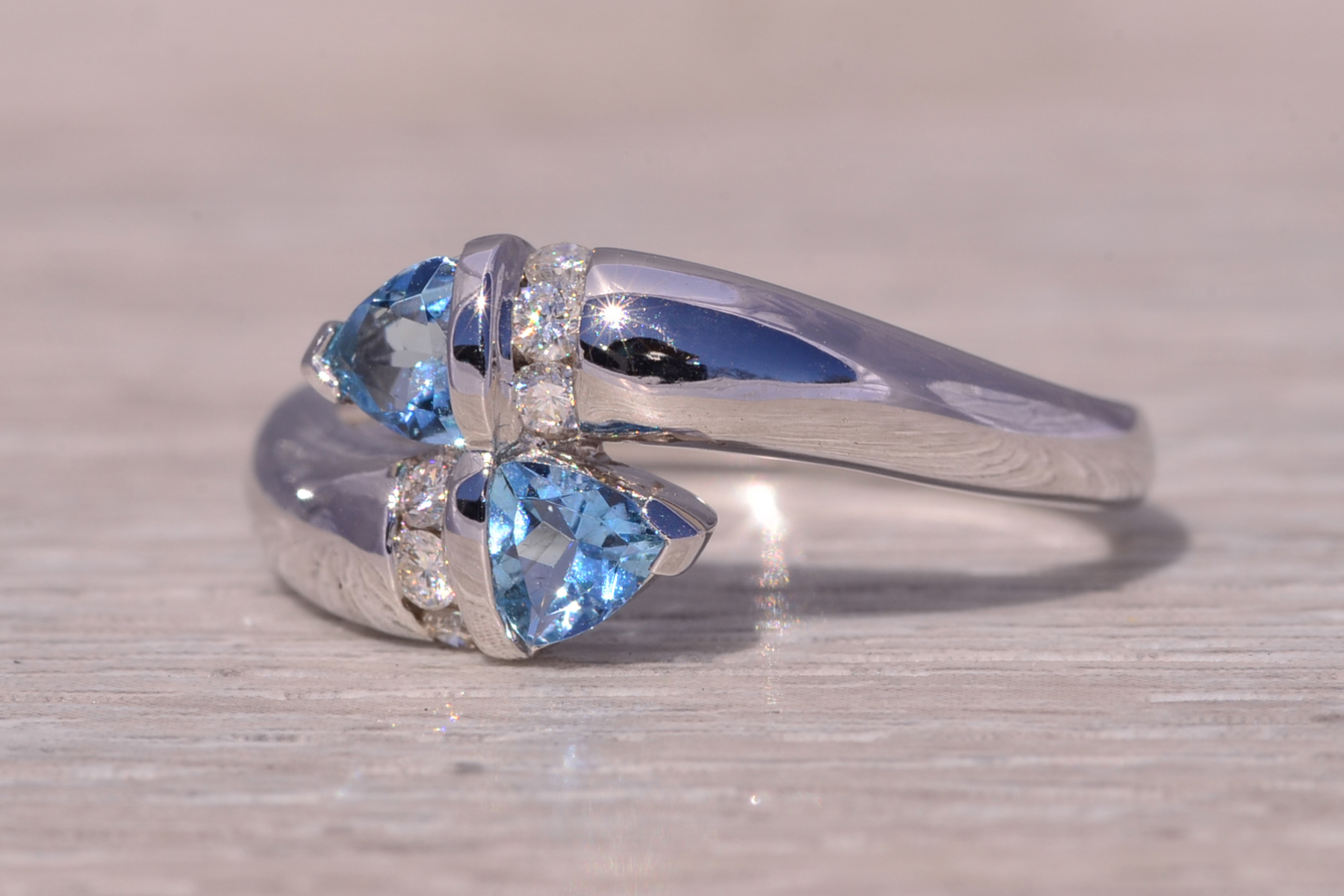The Ocean's Embrace: Aquamarine and Diamond Bypass Ring in White Gold - Image 3
